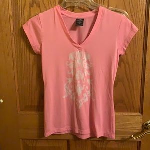 NWOT.  Pretty aerodynamics top.  Nice soft material.